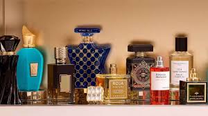Top 10 luxury perfumes of 2025 displayed elegantly, featuring premium bottles and designer fragrance brands.