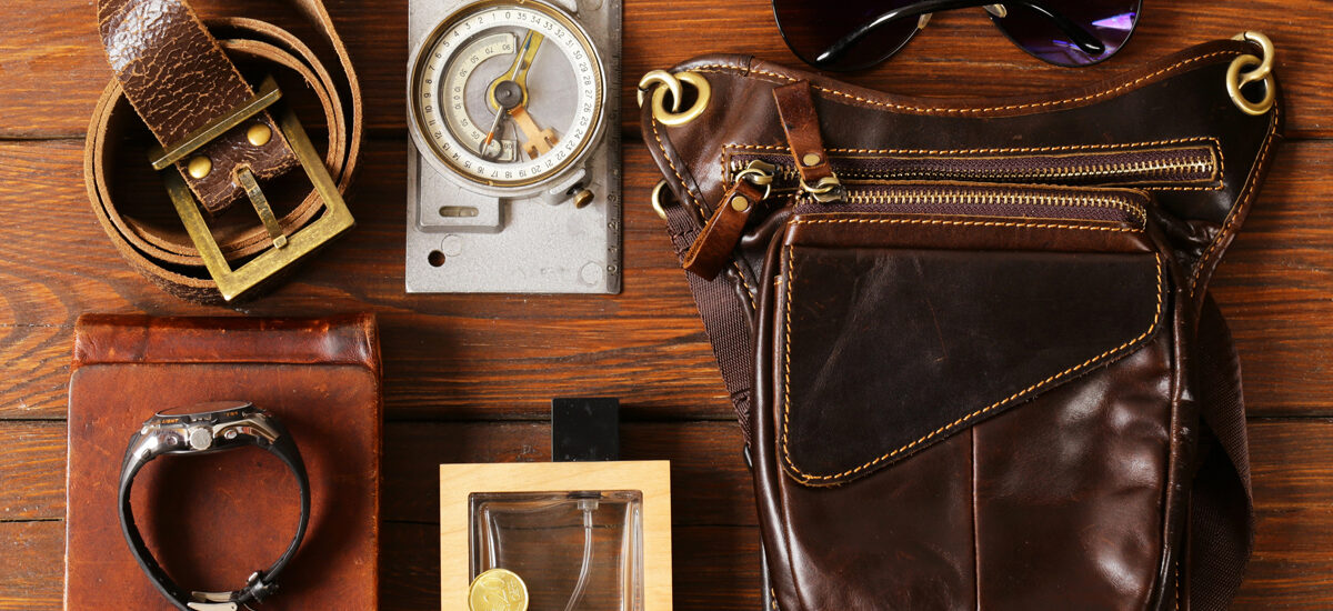 "2025 accessory trends featuring bold jewelry, statement belts, tech-integrated bags, and stylish sunglasses"