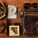"2025 accessory trends featuring bold jewelry, statement belts, tech-integrated bags, and stylish sunglasses"