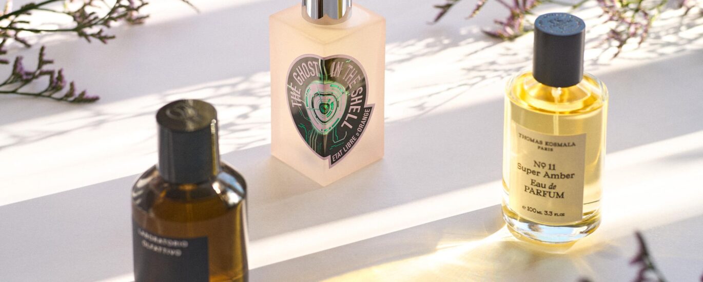 "Exclusive 2025 niche perfumes with artisanal bottles and rare ingredients symbolizing luxury and individuality"