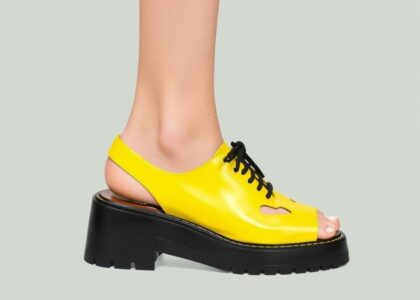 A pair of bold, chunky retro sneakers in vibrant colors representing 2025 trending footwear styles.