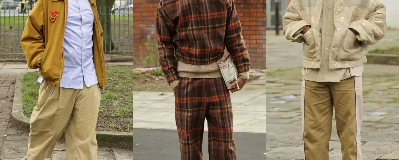 A group of stylish young adults confidently walking through a city street wearing bold 2025 streetwear trends including oversized silhouettes, vibrant colors, futuristic sunglasses, and statement accessories in a global urban setting.