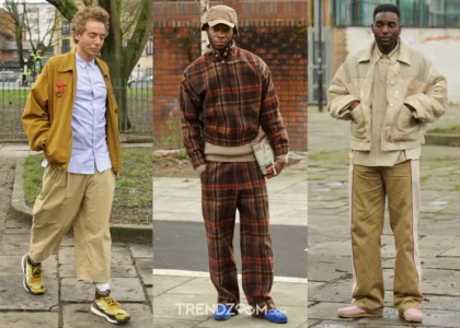 A group of stylish young adults confidently walking through a city street wearing bold 2025 streetwear trends including oversized silhouettes, vibrant colors, futuristic sunglasses, and statement accessories in a global urban setting.