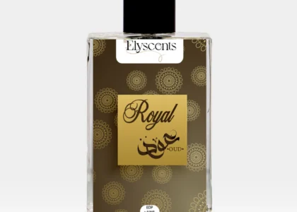 Elegant glass bottle of Royal Oud Elyscents fragrance surrounded by oud wood chips and amber, symbolizing luxury and warmth.