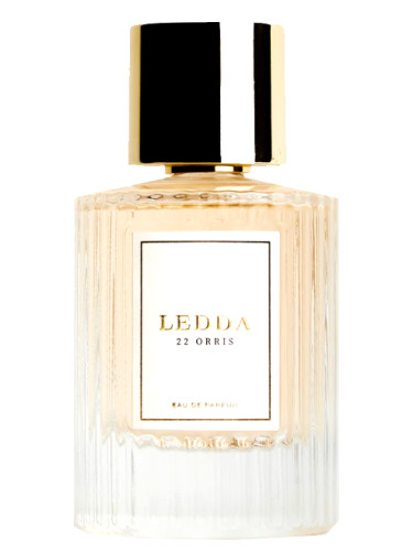 14 Isla Coco perfume bottle with tropical leaves and beach background