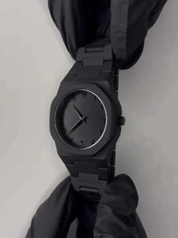 Arabic Aura Watch on wrist with sleek all-black design