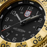 Close-up of the Luminox Navy SEAL Foundation Watch with gold-accented dial and Carbonox case, symbolizing honor and rugged elegance