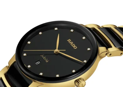 Rado 073.6022.3074 Centrix Diamonds Men Watch on display with black dial and diamond markers in soft ambient light.