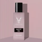 Elegant woman holding Majestic Feel for Women 30ml by Maaz Safder – luxury perfume with floral and musky notes