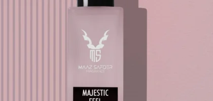 Elegant woman holding Majestic Feel for Women 30ml by Maaz Safder – luxury perfume with floral and musky notes