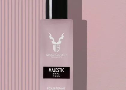 Elegant woman holding Majestic Feel for Women 30ml by Maaz Safder – luxury perfume with floral and musky notes