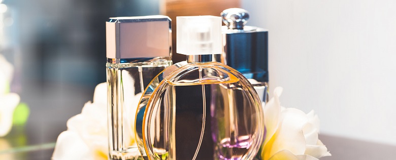 Elegant bottle of Notes to Self fragrance by Byza placed on a minimal wooden table with soft natural light, evoking calm and introspection.