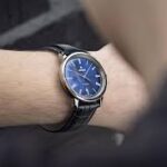 Elegant Rado Centrix Couple Watches placed side by side on a soft velvet surface, symbolizing love and unity"
