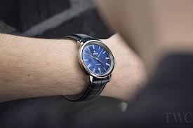 Elegant Rado Centrix Couple Watches placed side by side on a soft velvet surface, symbolizing love and unity"