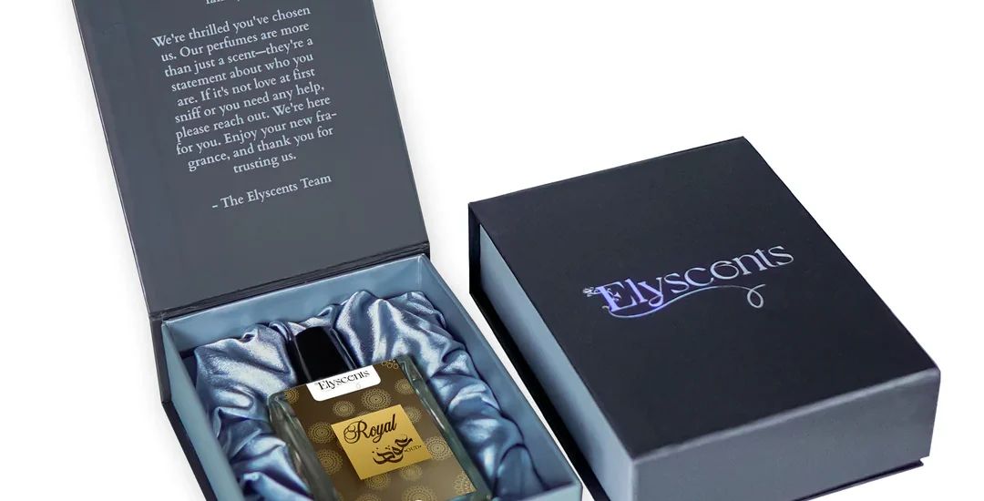 Royal Oud perfume bottle styled on dark velvet with golden lighting for a luxurious feel