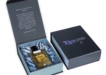 Royal Oud perfume bottle styled on dark velvet with golden lighting for a luxurious feel
