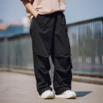 Pull&Bear parachute pants 2025 styled in a streetwear outfit.
