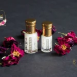 A stylish bottle of natural oud oil with prayer beads and a clean white background, symbolizing Sunnah elegance in 2025.