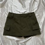 Gen Z girl styling Zara Cargo Skort in summer streetwear outfit