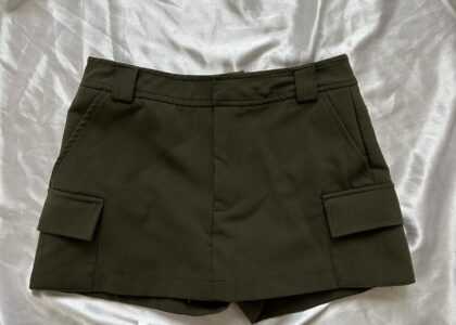 Gen Z girl styling Zara Cargo Skort in summer streetwear outfit
