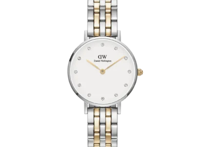 Daniel Wellington Petite Lumine Watch on wrist with gold bracelet, minimalist fashion accessory 2025