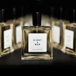 A flat lay of globally inspired fragrances with cultural elements from around the world