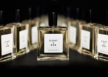 A flat lay of globally inspired fragrances with cultural elements from around the world